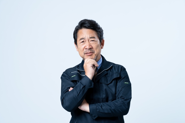 考える人