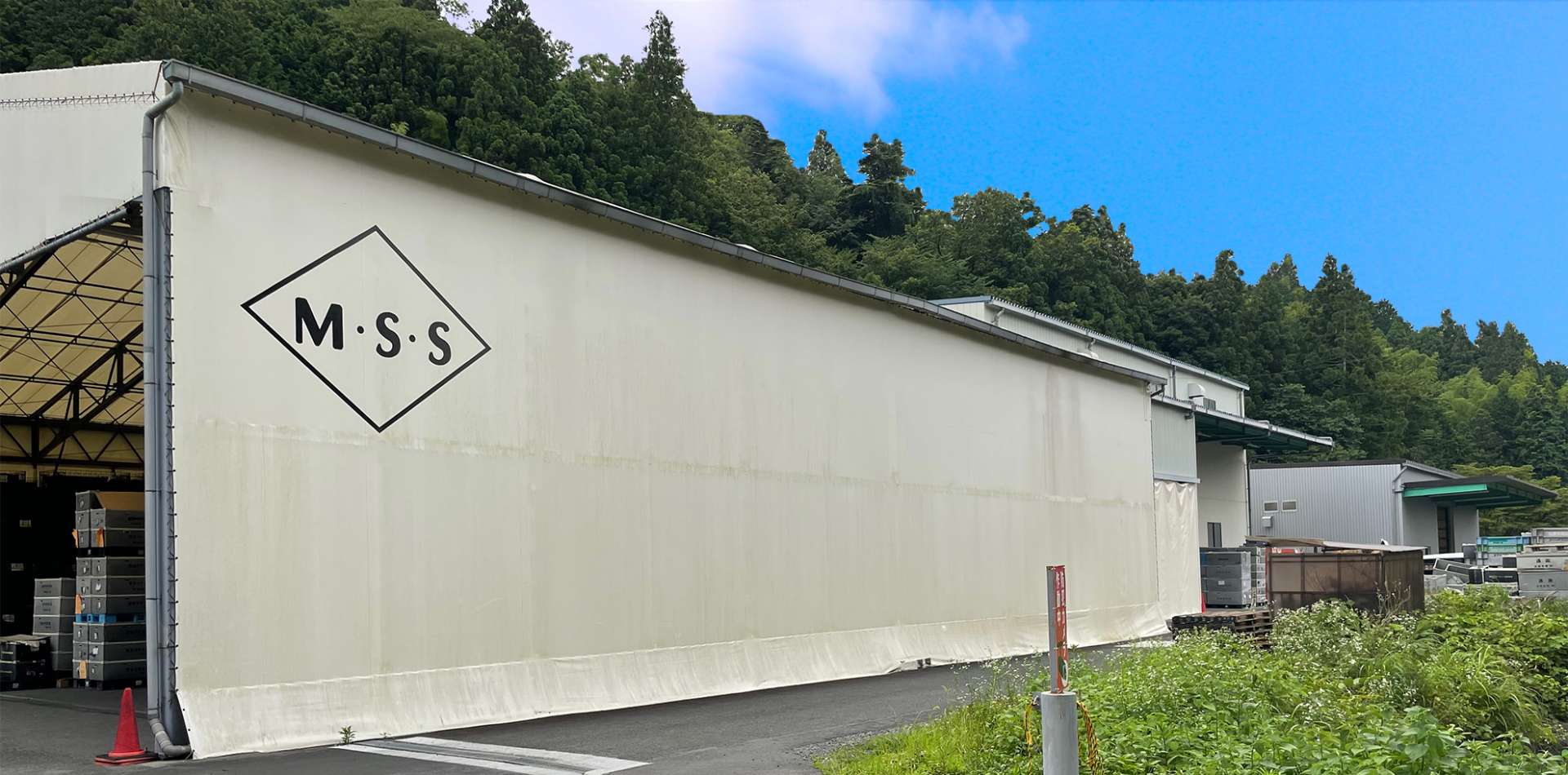 有限会社望月製作所のロゴ