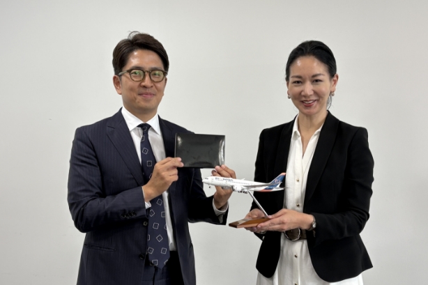 高津紙器株式会社のロゴ