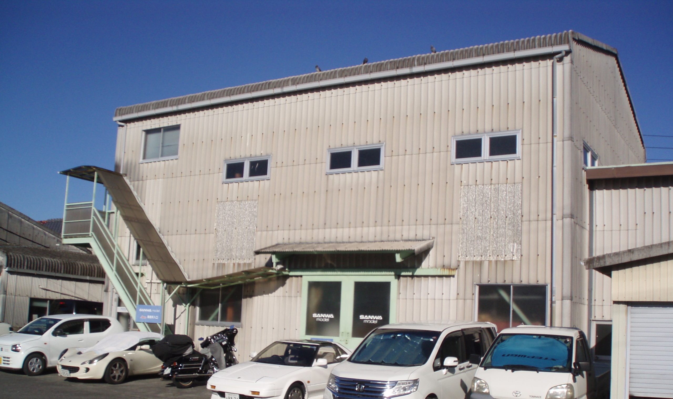 株式会社三和モデル製作所のロゴ