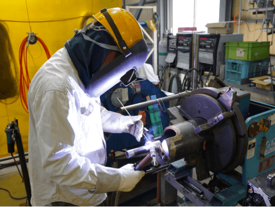 広伸プラント工業株式会社のロゴ