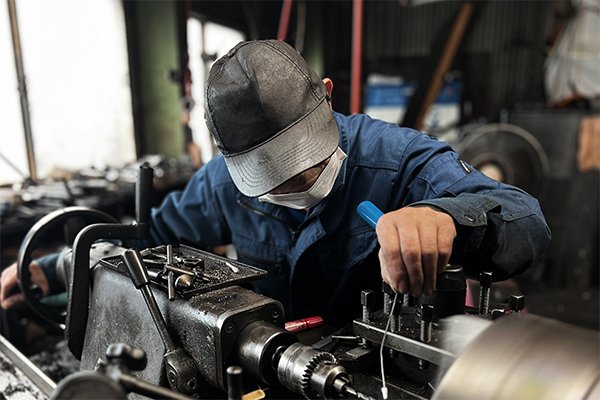 有限会社水野鉄工所のロゴ