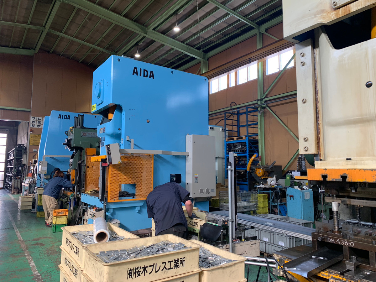 有限会社櫻木プレス工業所のロゴ